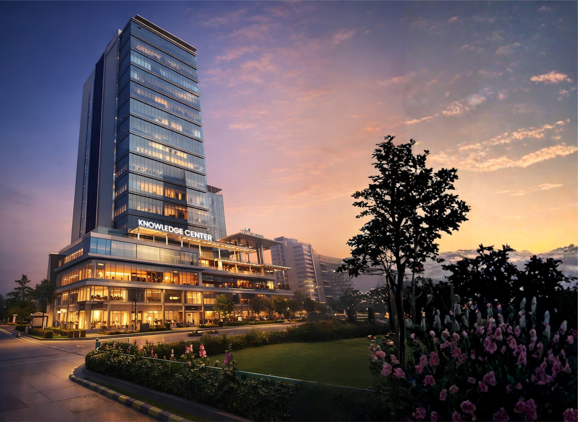 The Knowledge Center building at dusk, its name lit across the facade